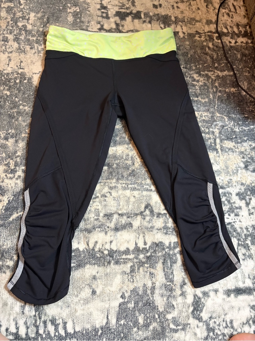 Lululemon- capri leggings with green and white polka dot waist band